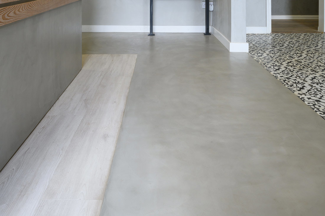 Cemcrete CreteCote Grey floor with wood and tile inlays